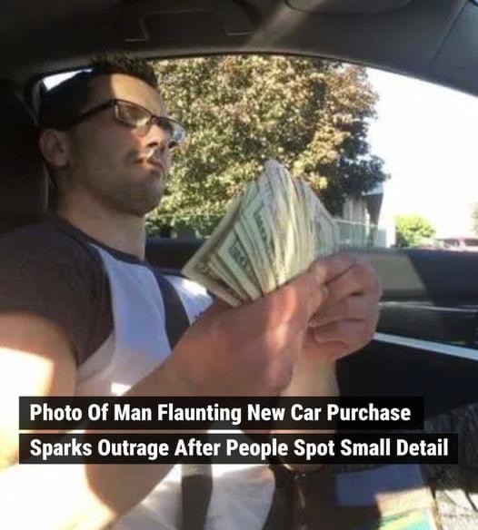 Photo Of Man Flaunting New Car Purchase Sparks Outrage After People Spot Small Detail